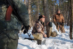 Ivan (left), Constantine (center) and Vladimir (right) are installing a camera trap in the Ussurisk Zapovednik